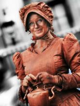 Copper Lady Statue - copper and brown themed acts form the Streetentertainers Agency